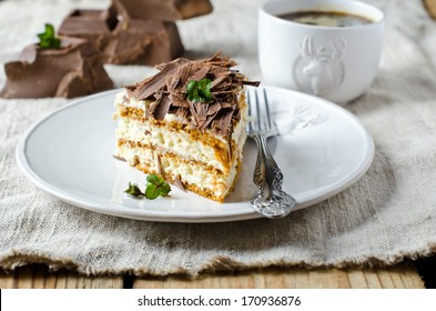 Sponge cake with cream and chocolate - Shutterstock ID 170936876