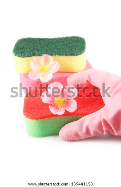 Sponge and hand in a rubber glove, cherry\
flowers, symbol of spring and\
purification