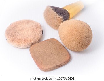 Sponge And Makeup Brushes Used To Be Old And Dirty,On A White Background Isolated.