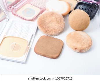 Sponge And Makeup Brushes Used To Be Old And Dirty. On A White Background Isolated