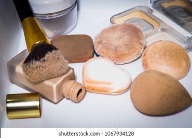 Sponge And Makeup Brushes Used To Be Old And Dirty. On A White Background Isolated.