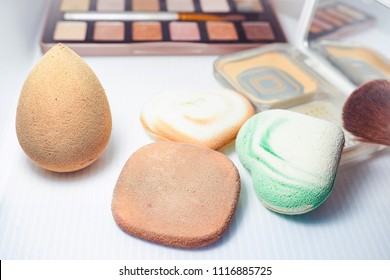 Sponge And Makeup Brushes Used To Be Old And Dirty,On A White Background Isolated