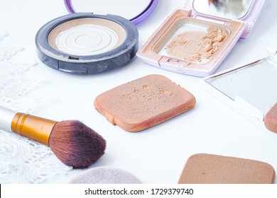 
Sponge And Makeup Brushes Used To Be Old And Dirty. On A White Background Isolated