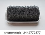 Sponge for shoes on a white background. Close-up