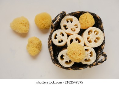  Sponges And Loofah Washcloths In A Wicker Basket On A Light Beige Background.Zero Waste Hygiene Products. Bio Natural Cosmetics.reasonable Consumption