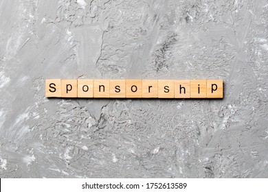 Sponsorship Word Written On Wood Block. Sponsorship Text On Table, Concept.