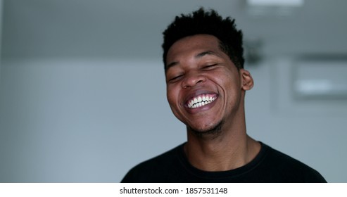 Spontaneous Black Man Burst Laughing Out Loud. African Person Authentic Real Life Laugh And Smile