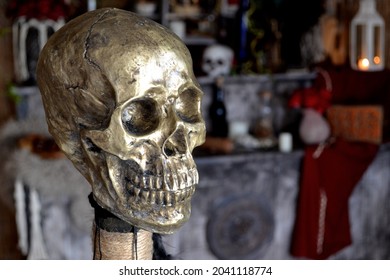 Spooky Background With Voodoo Scepter Skull To The Left And Right Side Of The Writing. Golden Skull In The Foreground And A Voodoo Altar In The Background. 