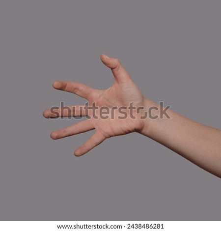 Spooky or creepy hand gesture isolated on grey background. Scary zombie halloween hands. Angry hands expression.