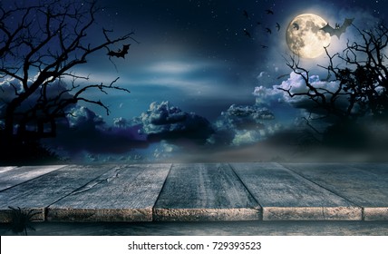Spooky halloween background with empty wooden planks, dark horror background. Celebration theme, copyspace for text. Ideal for product placement - Shutterstock ID 729393523