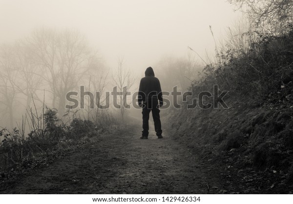 Spooky Hooded Figure Standing On Country Stock Photo (Edit Now) 1429426334