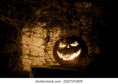 spooky Jack'o'lantern Halloween pumpkins glowing in the night - Powered by Shutterstock