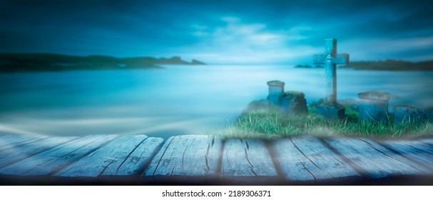 A Spooky Nighttime Background Scene Of A Misty Sky And Sea With Gravestones And Rustic Wooden Bench For Halloween Product Placements.