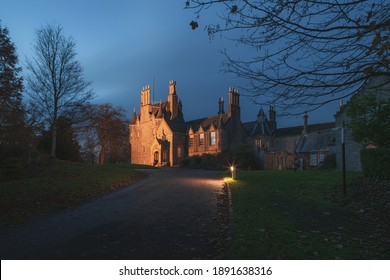 Spooky view of the historic 16th century Lauriston Castle on an autumn night in Edinburgh.