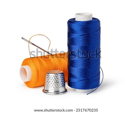 Spool of Thread and Needle isolated on white background