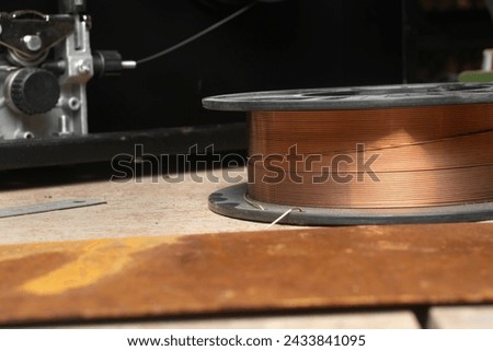 Spool of wire for semi-automatic welding machine MIG MAG.
