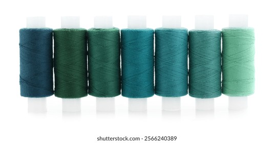 Spools of bright sewing threads isolated on white