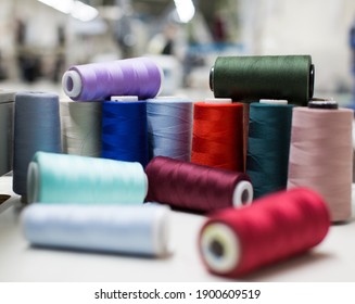 Spools Of Colorful Threads In An Alteration Shop.