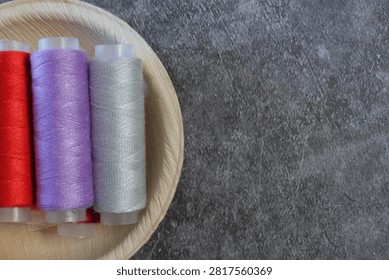 spools of sewing thread in different colors