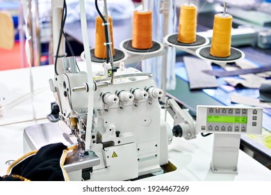 Spools of thread and overcasting four-thread sewing overlock