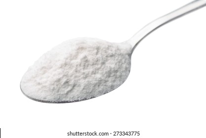 Spoon Of Baking Soda Isolated On White