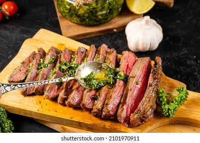 Spoon The Chimichurri Sauce Over The Steak.