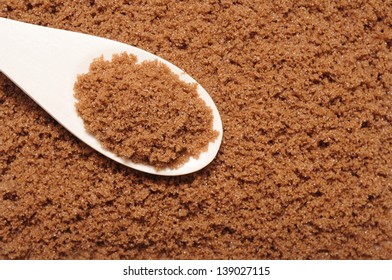 A Spoon With Dark Brown Sugar