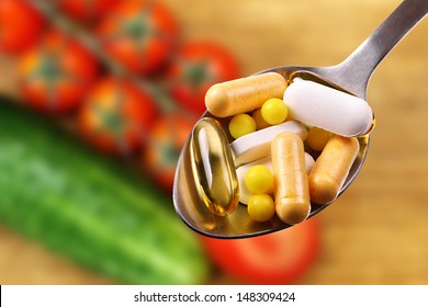 spoon with dietary supplements