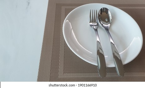 spoon fork white dish mat