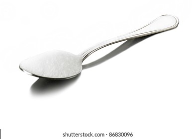 A Spoon Full Of Sugar On White Background