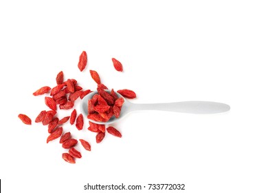 Spoon With Red Dried Goji Berries On White Background