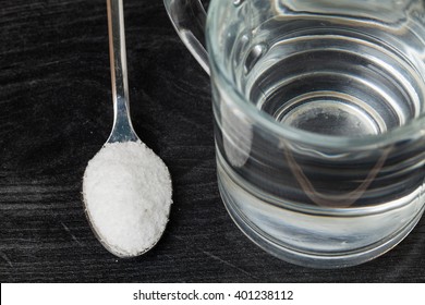 Spoon Of Salt, Sugar, Soda With Glass Of Water