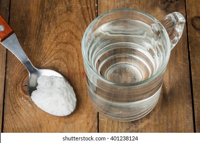 Spoon Of Salt, Sugar, Soda With Glass Of Water