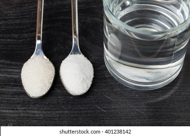 Spoon Of Salt, Sugar, Soda With Glass Of Water