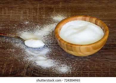 Spoon Of Salt, Wooden Bowl With Salt On Wooden Table