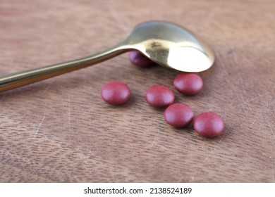 Spoon And Some Western Medicine On The Table