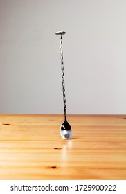 Spoon Stainless Stell On The Table Wooden.