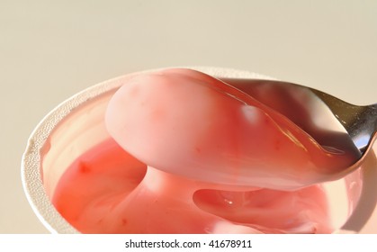 Spoon With Strawberry Yogurt In A Cup, Copy Space