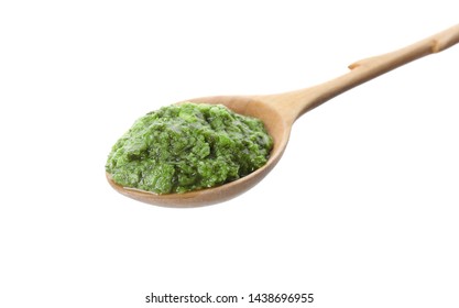 Spoon Of Tasty Pesto Sauce Isolated On White