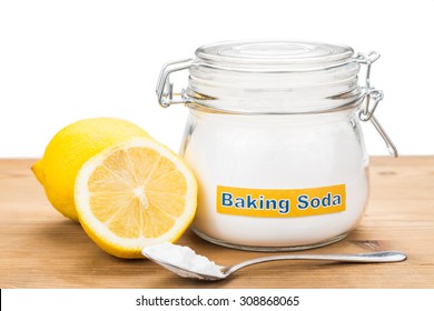 Spoonful of baking soda and lemon fruits for multiple holistic usages