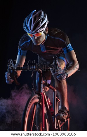 Similar – Man on bicycle preparing for triathlon race