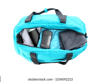 Sport Bag With Deodorant And Clothes On White Background, Top View