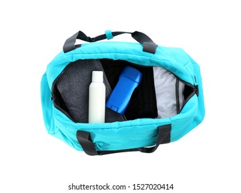 Sport Bag With Deodorants And Clothes On White Background, Top View