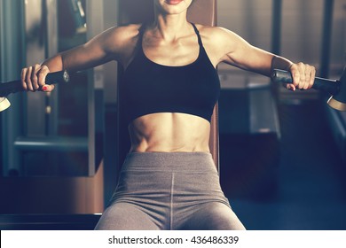 Sport. Beautiful woman in gym - Shutterstock ID 436486339