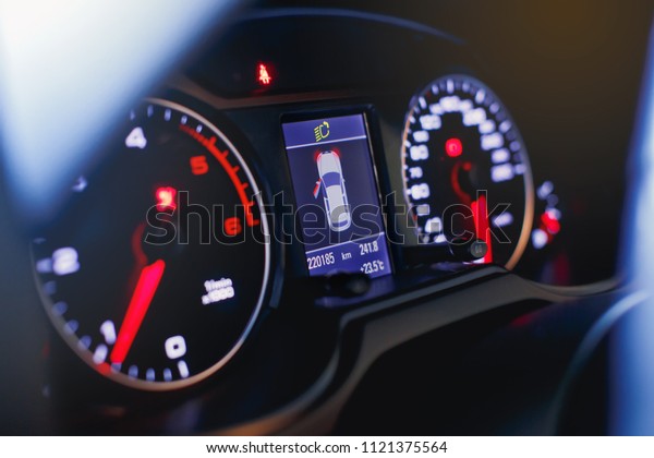 Sport\
car speedometer and fuel indicator. Close up\
view