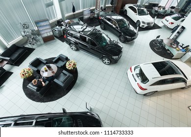 Sport cars in luxury auto salon are on sale