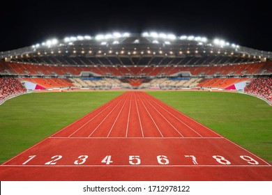 Sport Competition Race Running Red Track In Stadium. 