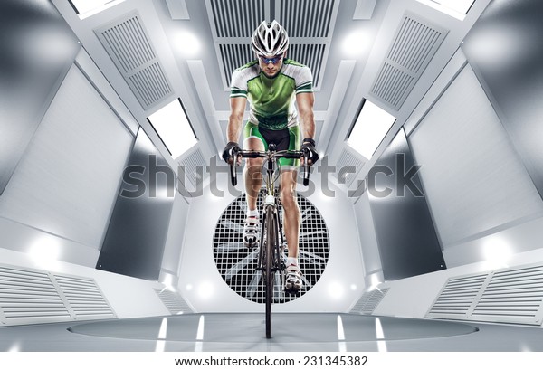 Sport. Cyclist\
has a traning in the wind\
tunnel