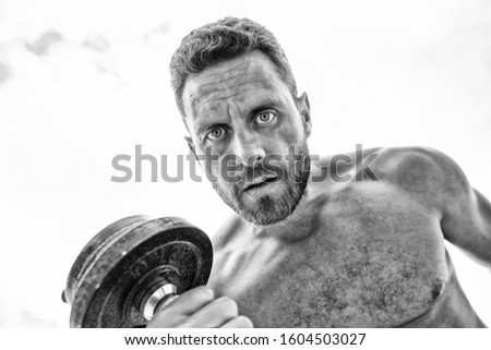 Sport equipment. Fitness and bodybuilding sport. Sport lifestyle. Success is choice. Winning is habit. Dumbbell exercise gym. Muscular man exercising with dumbbell. Sportsman with strong torso.