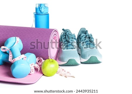 Sport equipment on white background. Yoga mat, sneakers, dumbbells and bottle of water. Healthy lyfestyle, fitness and diet.